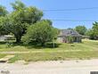 711 main st, henrietta,  MO 64036