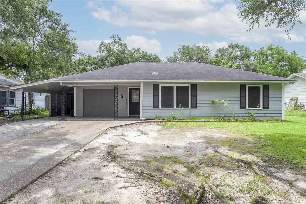 5 circle p, orange,  TX 77630